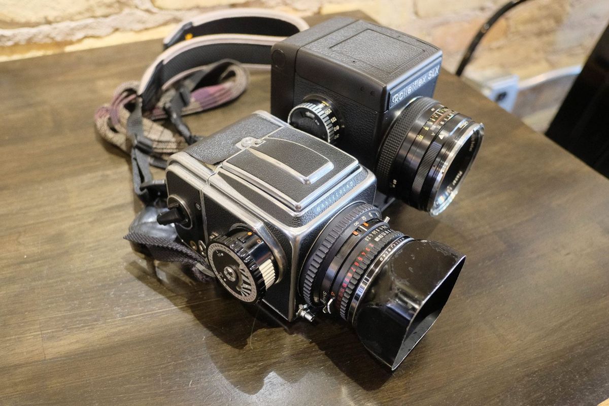 Rolleiflex SLX next to a Hasselblad 500 C/M