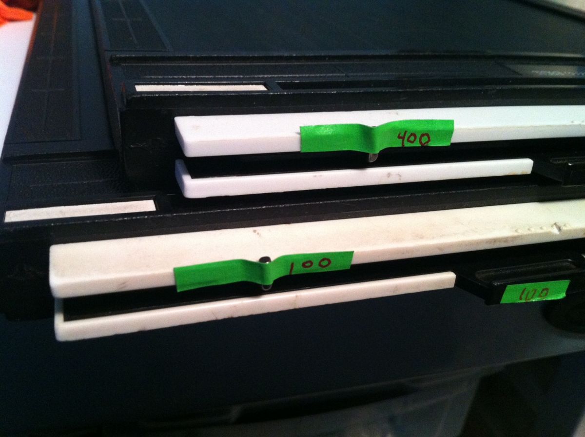 Save ruined sheet film with a little bit of tape.
