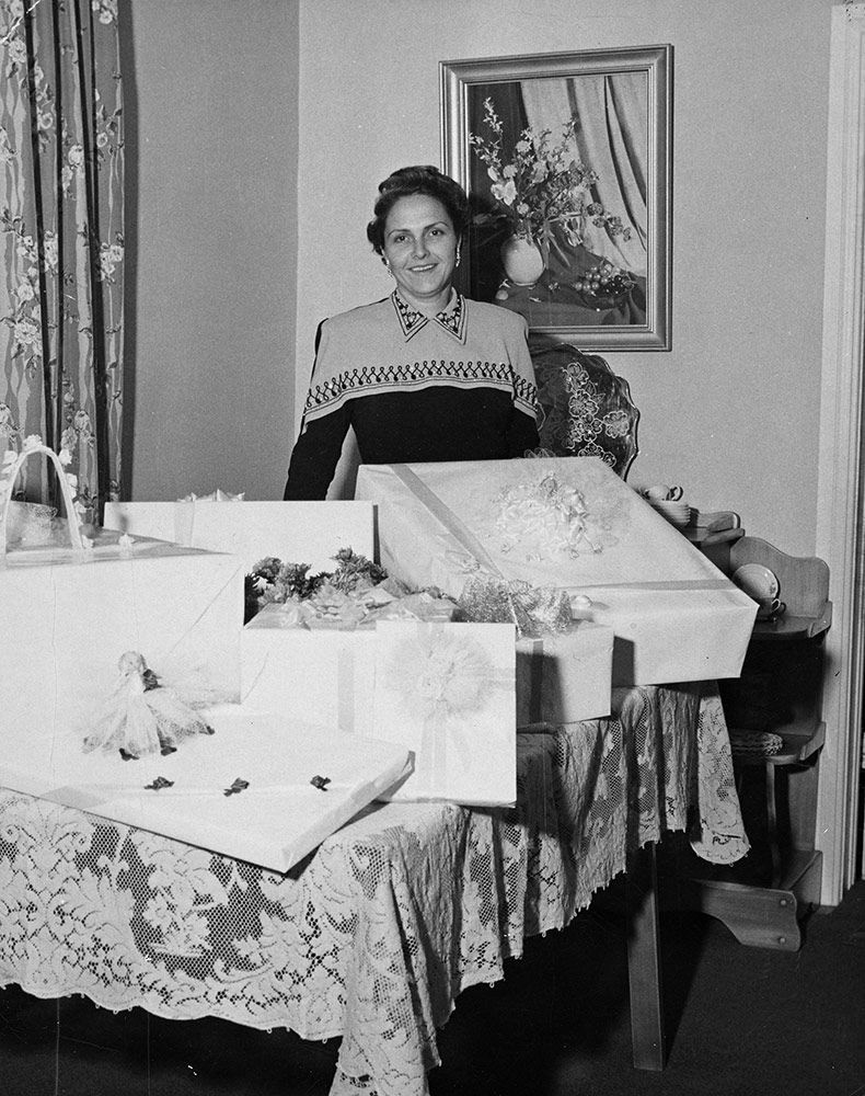 A woman with large boxes