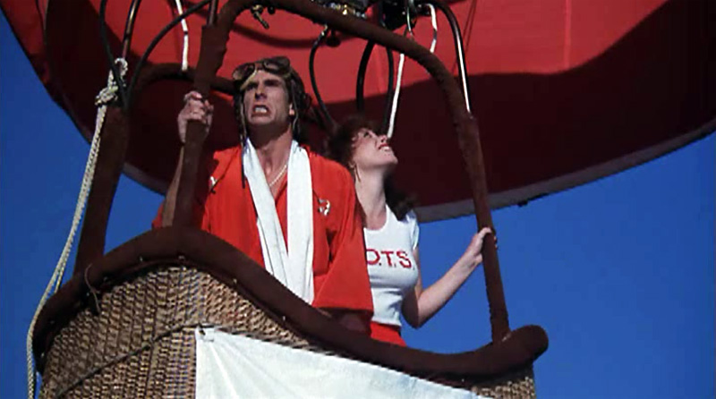 Mad Dog senses topless college girls.