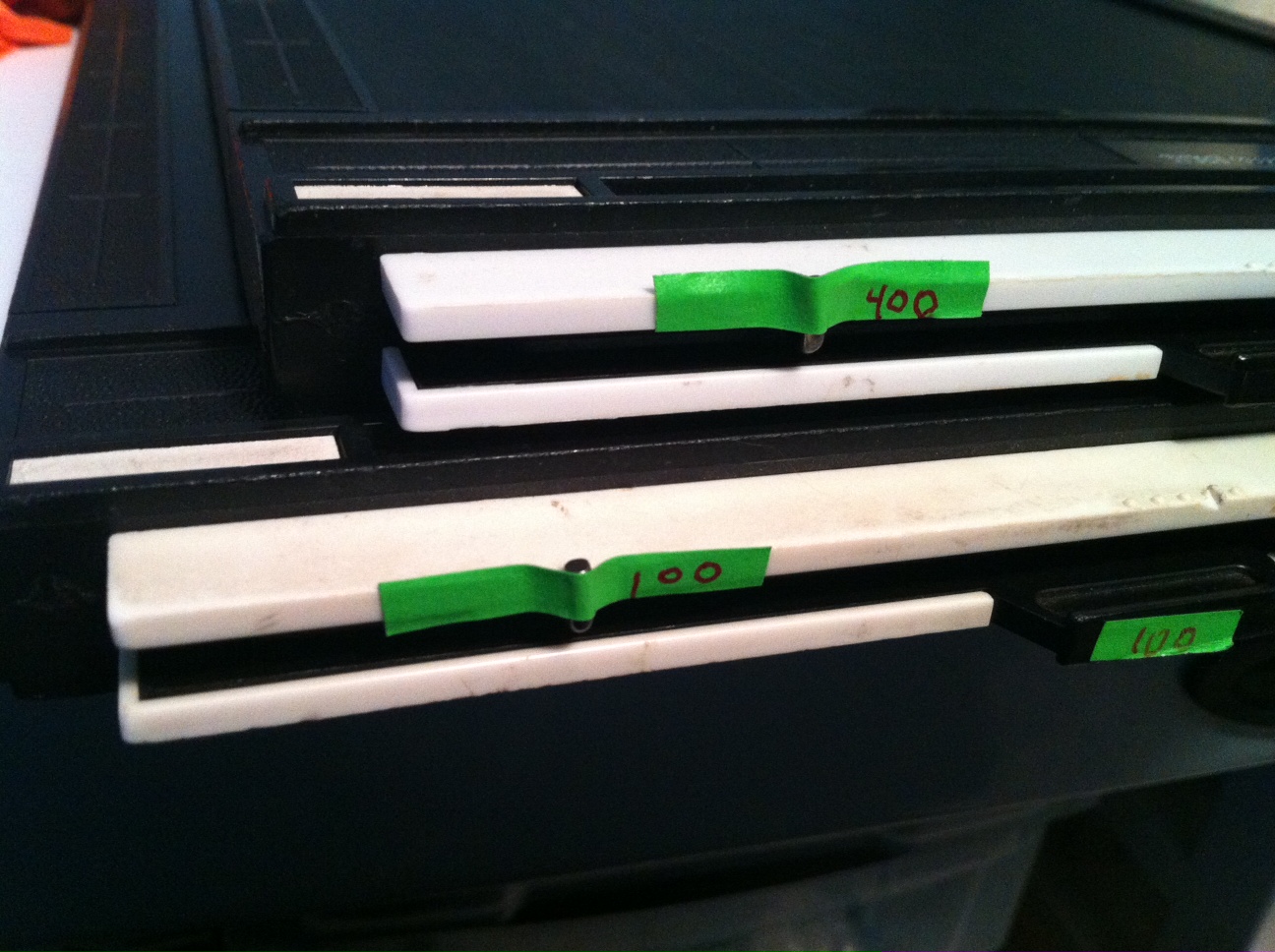 Save ruined sheet film with a little bit of tape.