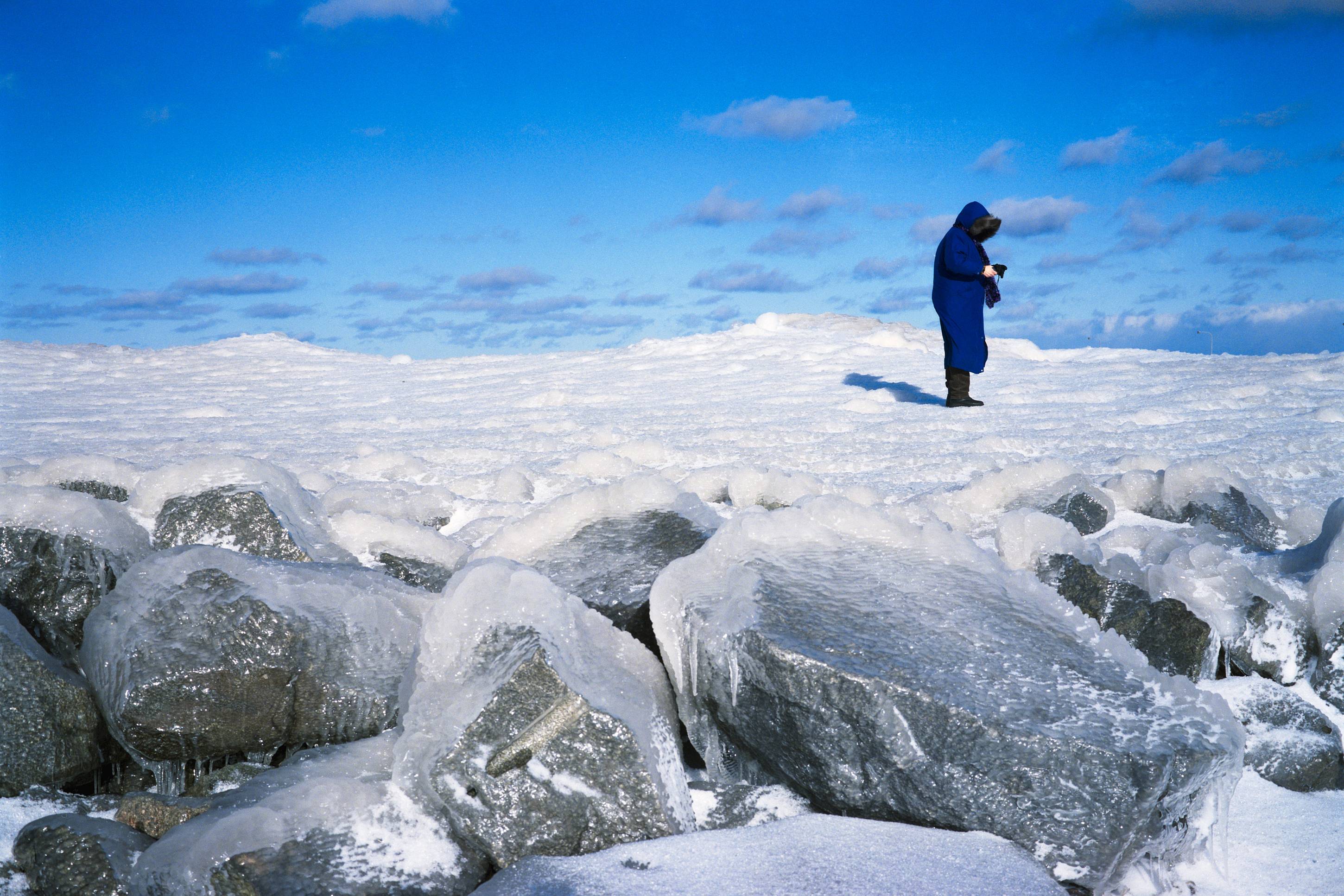 A Woman Walks on Ice, Duluth, Minnesota, February 2011